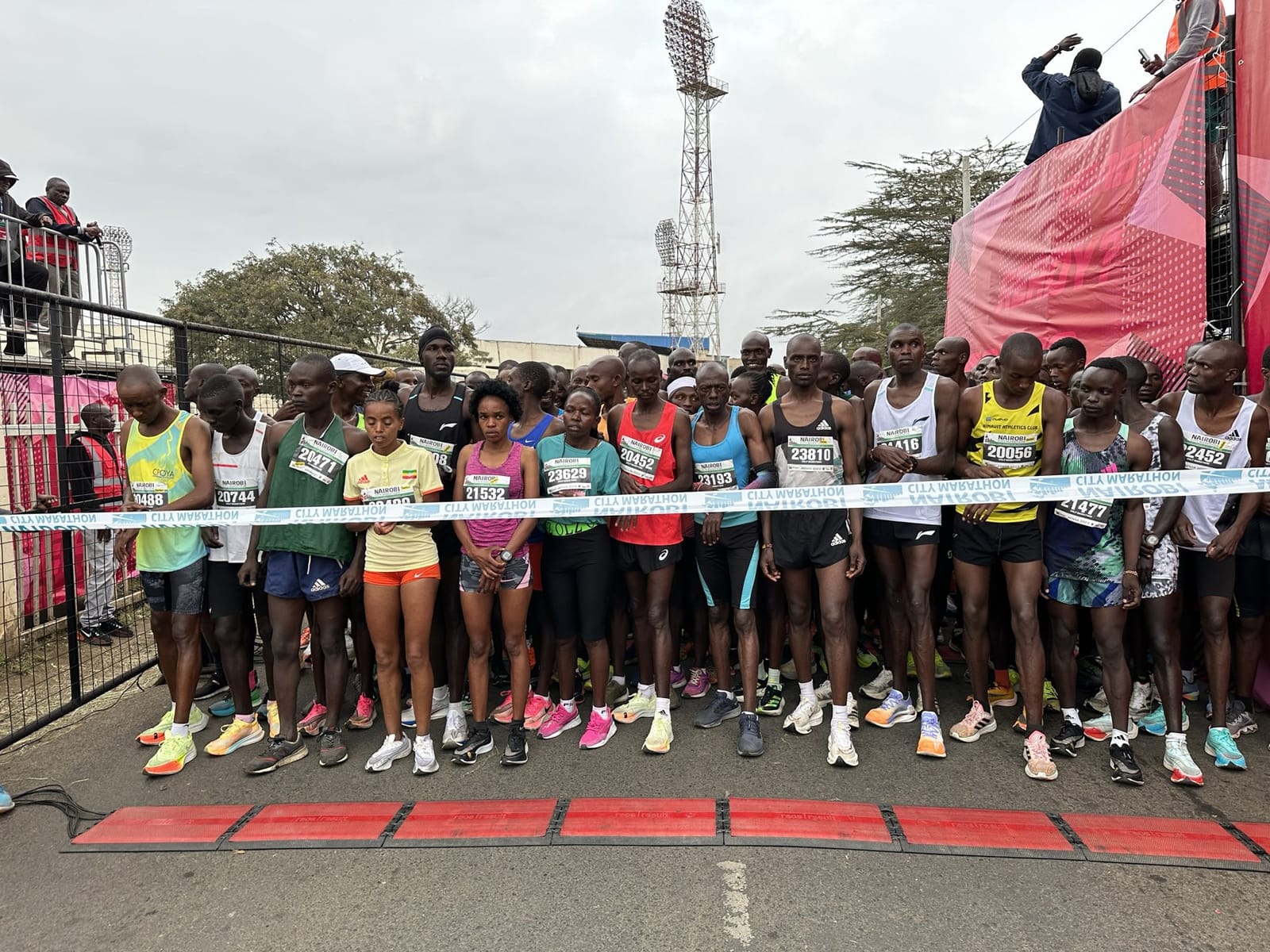 Runners crowd behind the start line of a road marathon near Nyayo National Stadium, Nairobi, Kenya (file photo, July 2023).