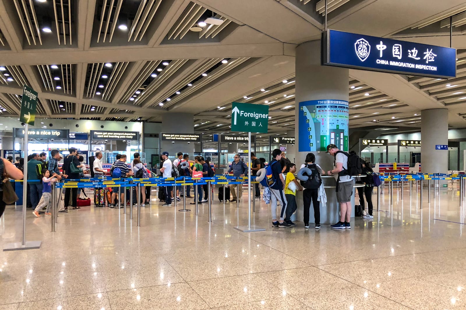 Departure immigration inspection counters for foreigners at Terminal 3E, Beijing Capital International Airport (file photo, 2018).