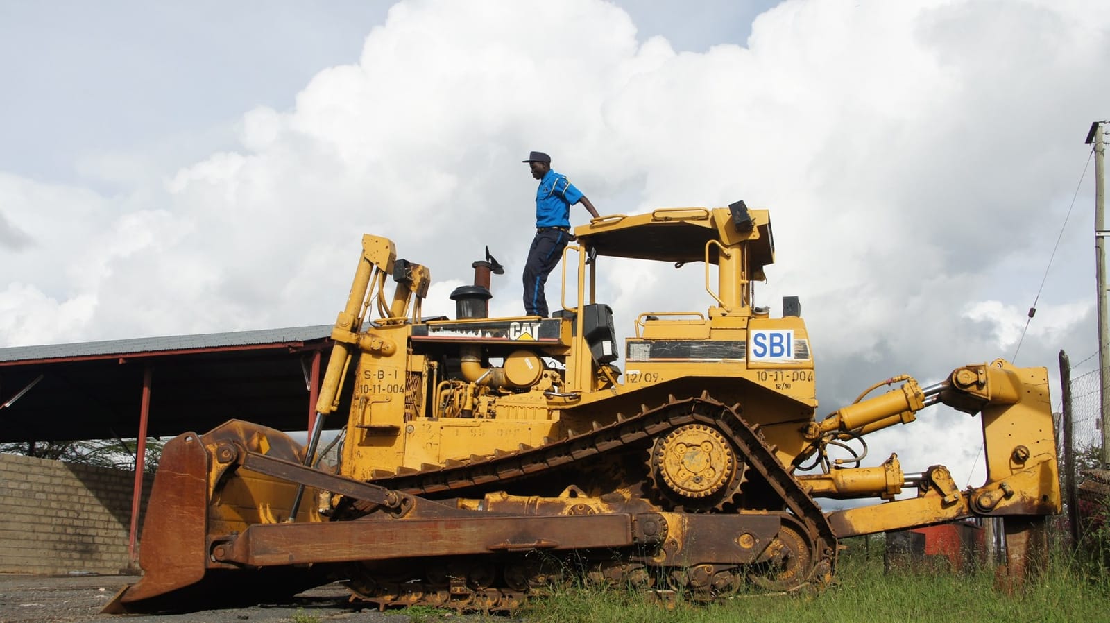 A crawler bulldozer at a road construction site in Kenya (file photo, 2013; not equipment from the sale).