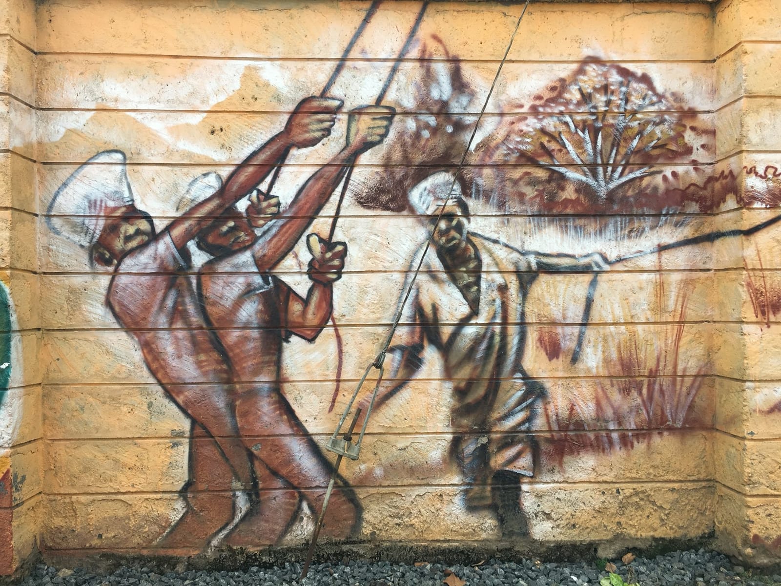 A mural of figures with spears on a wall in central Nairobi (file photo, 2017).