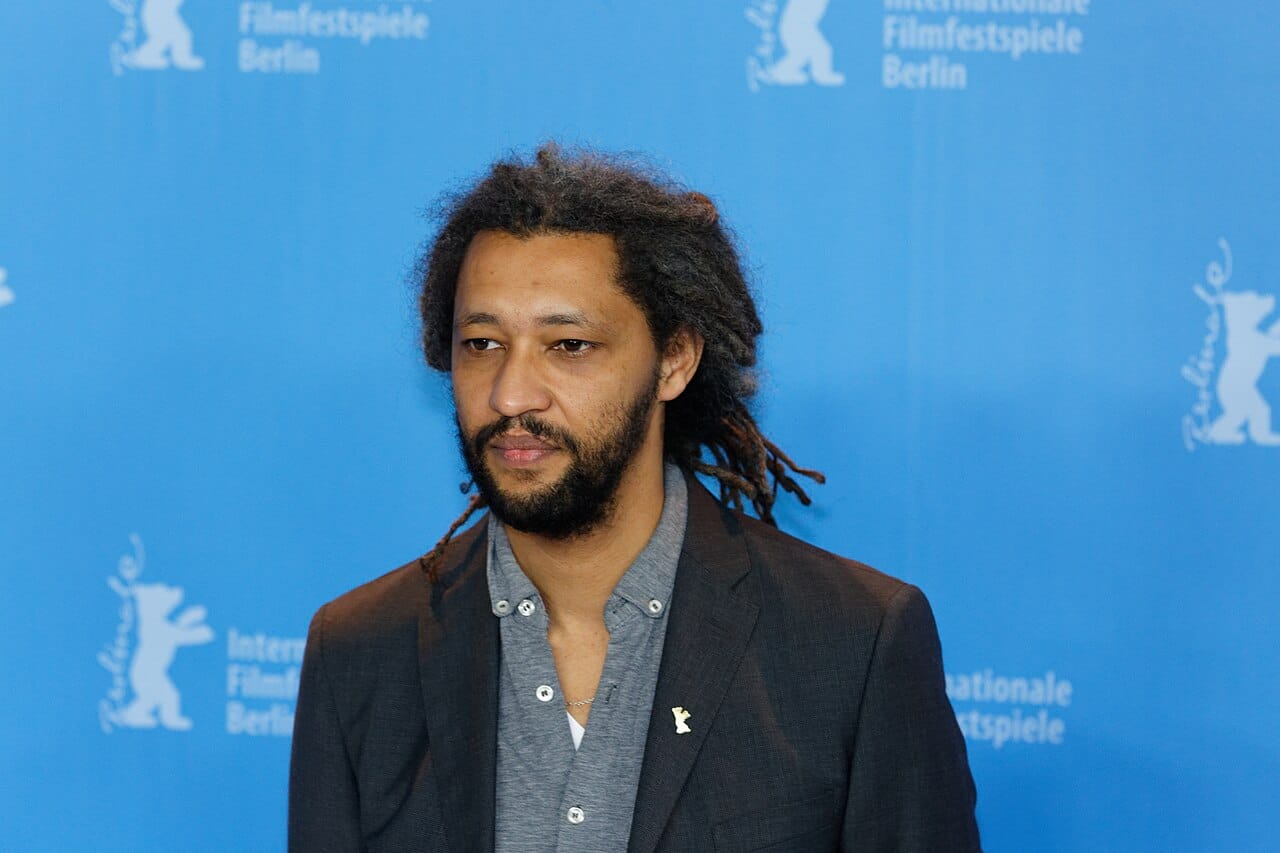 Senegalese-French director Alain Gomis at a photo call for his film Félicité at the 2017 Berlin International Film Festival. File photo, not from this year's event; Gomis is the subject of NBO Film Festival 2026's first-ever filmmaker retrospective.