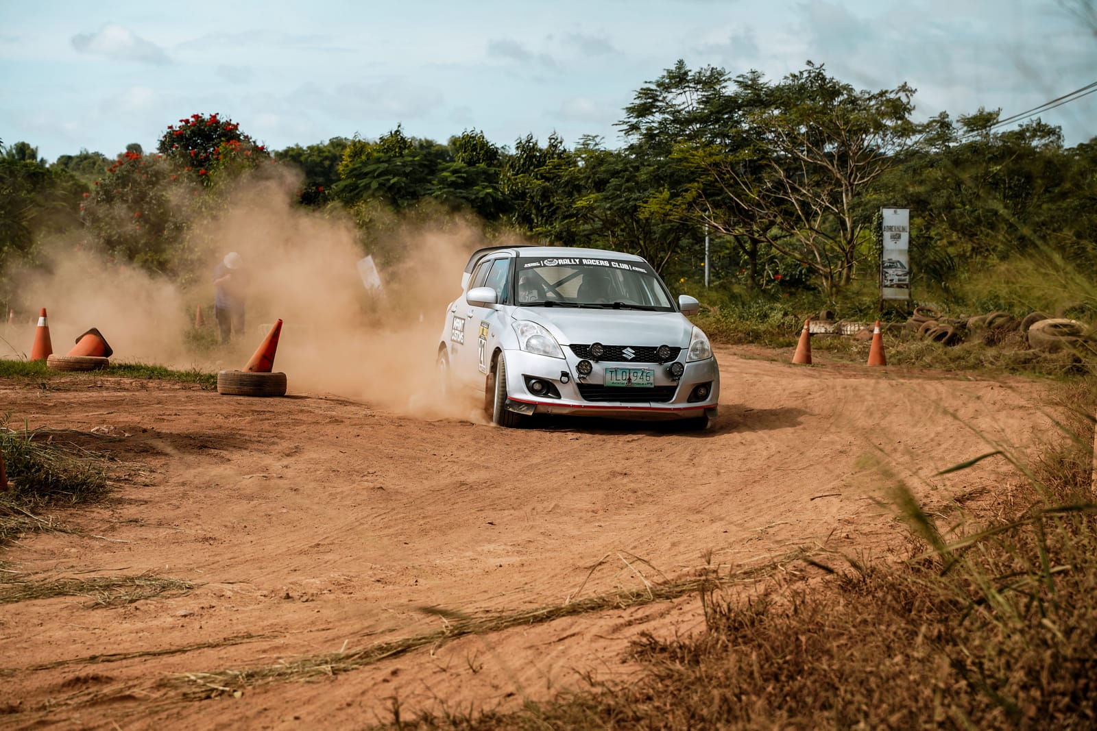 File photo: a rally car raising dust on a gravel stage. It is a generic image and does not show Karan Patel, the Serengeti Rally or any 2026 ARC event.