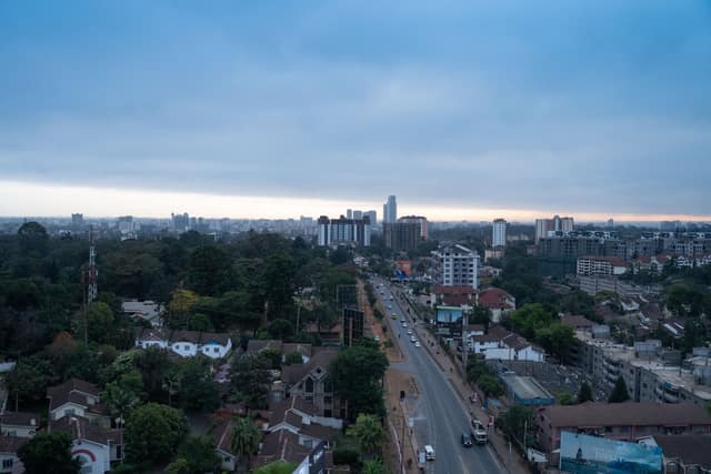 Nairobi's skyline above a main road under a cloudy sky (file photo).