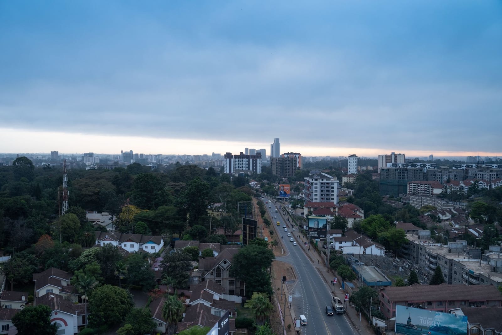 Nairobi's skyline above a main road under a cloudy sky (file photo).